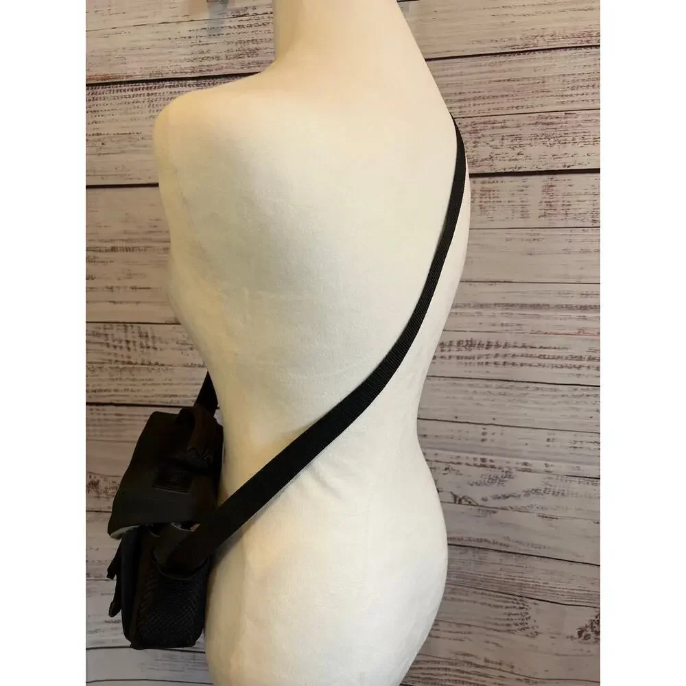 Samsonite small padded camera bag small electronics adjustable shoulder strap.